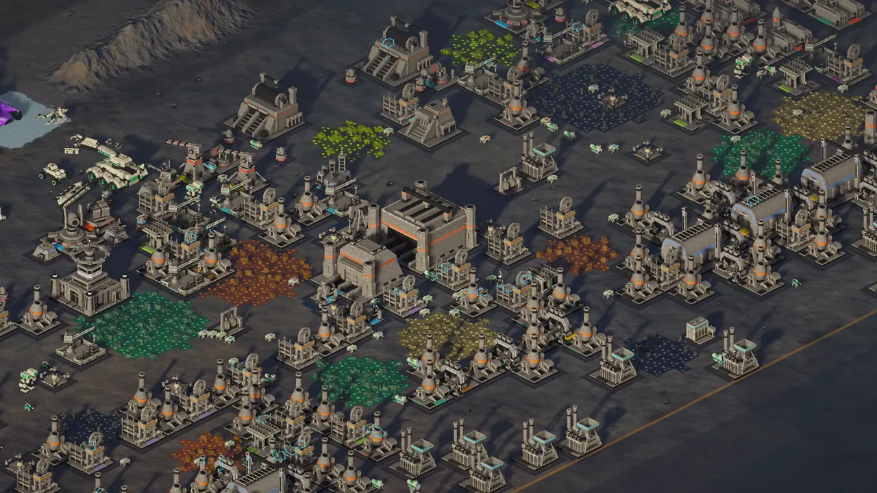 The sun sets over the factory, the shadows lengthen and the base's lights come on in the dark.
